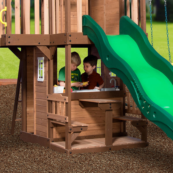 Provide hours of entertainment with a grill, plastic food, and a four-person picnic area alongside swings and a trapeze.
