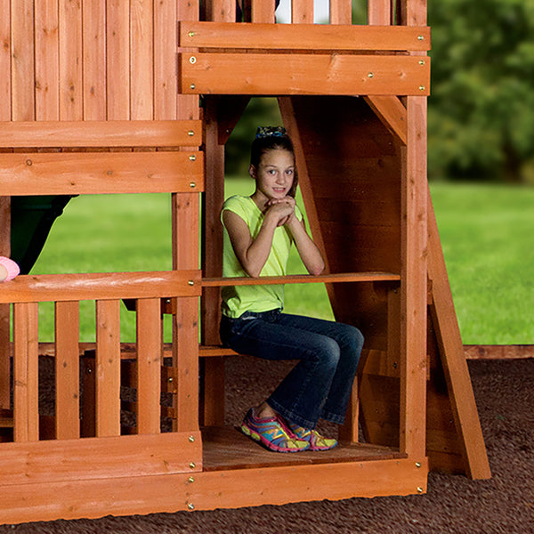 From swings to a trapeze, sandbox to sitting area, slide to sun deck, there are a lot of features packed into this beautiful swing set.