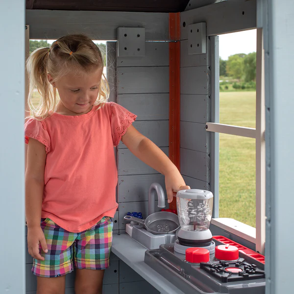 Spark creativity in a tiny baker's haven complete with a powered blender, working bell and hinged door.