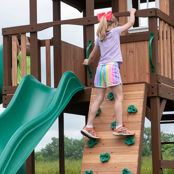 Our wooden swing sets offer a wide range of sizes, features, and styles that will turn any backyard into a playground.