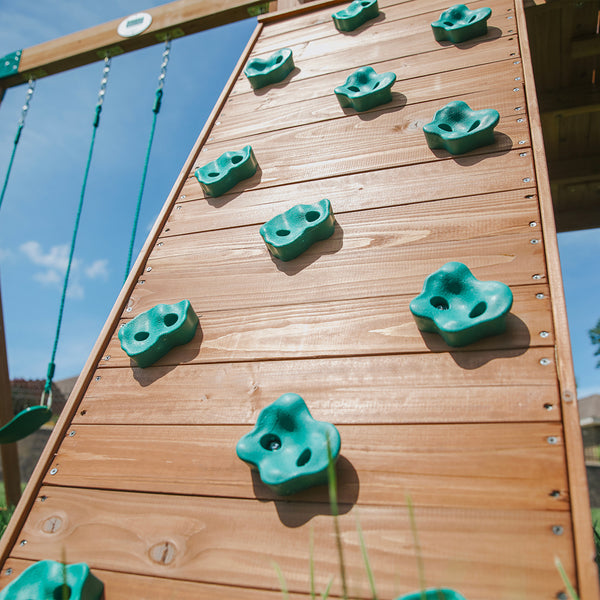 Our wooden swing sets offer a wide range of sizes, features, and styles that will turn any backyard into a playground.