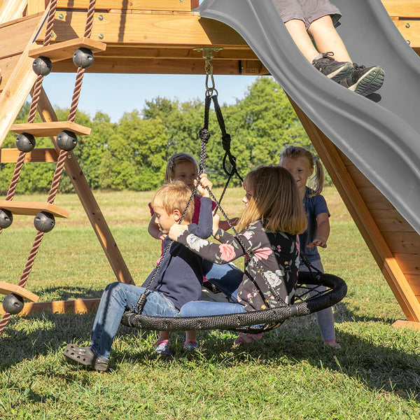 Endless Hours of Fun Featuring a combination of climbing options on both sides of the spacious, covered clubhouse, it’s a great choice for improving balance, motor skills, and hand/eye coordination. And when they need a break, kids can relax in the 40” spinning disc web swing underneath.