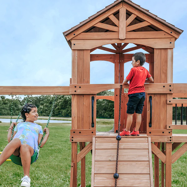 Our wooden swing sets offer a wide range of sizes, features, and styles that will turn any backyard into a playground.