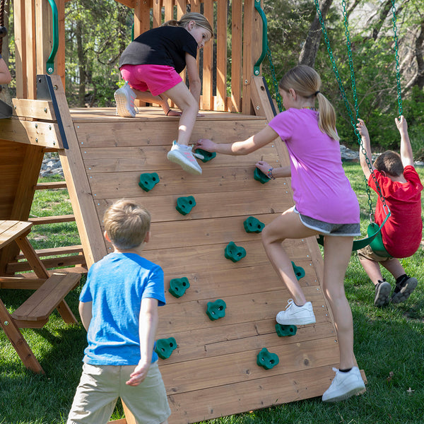 Our wooden swing sets offer a wide range of sizes, features, and styles that will turn any backyard into a playground.