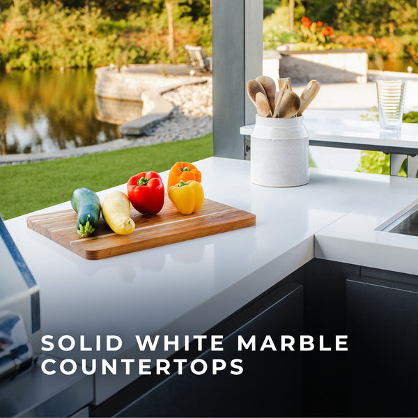 Refined solid white marble countertops infuse your outdoor kitchen with a luxurious and sophisticated aesthetic, adding classic yet modern style. Fine craftsmanship provides enduring performance that’s ideal for everyday use and entertaining.
