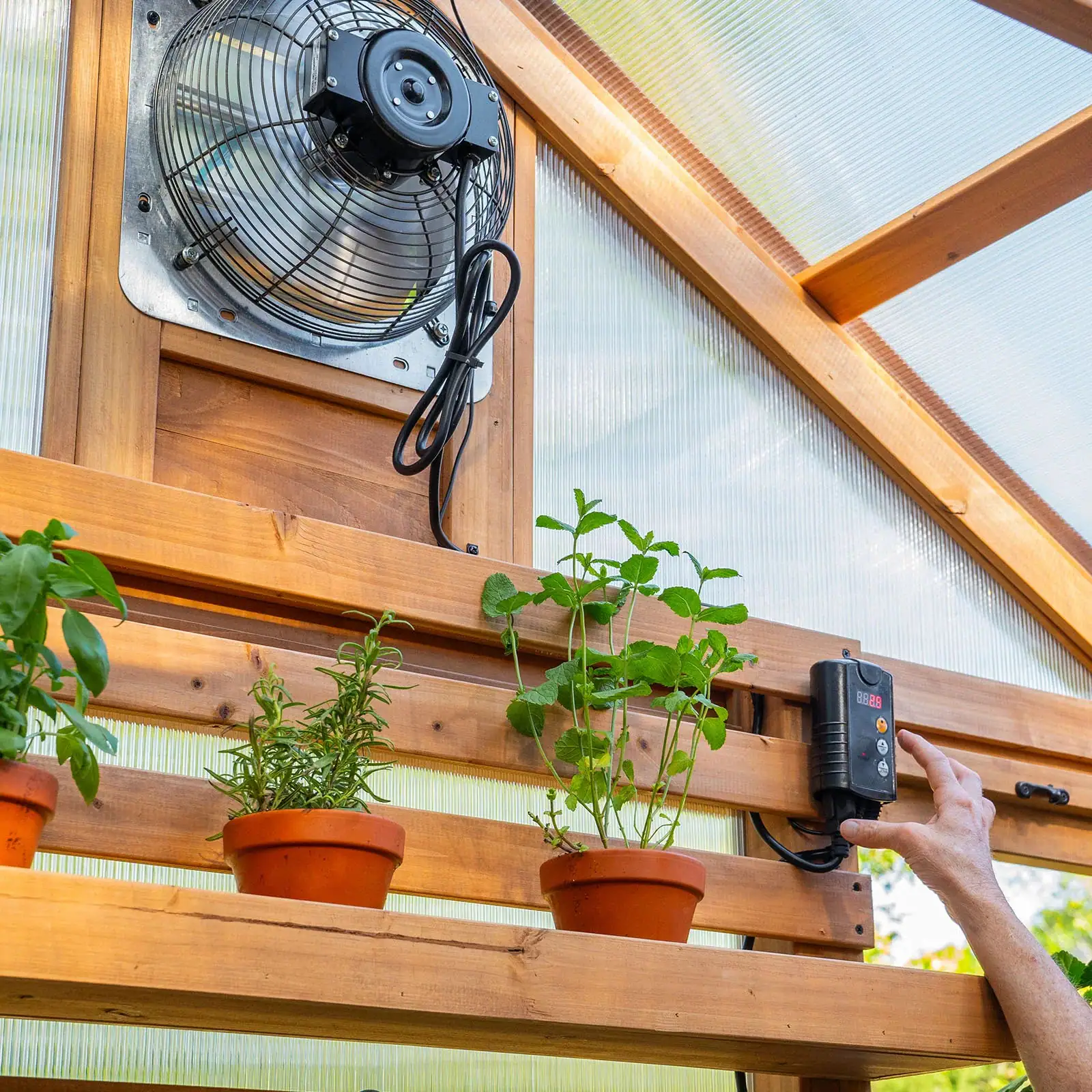 Temperature-activated exhaust fan helps manage rising temperatures to create ideal growing conditions.