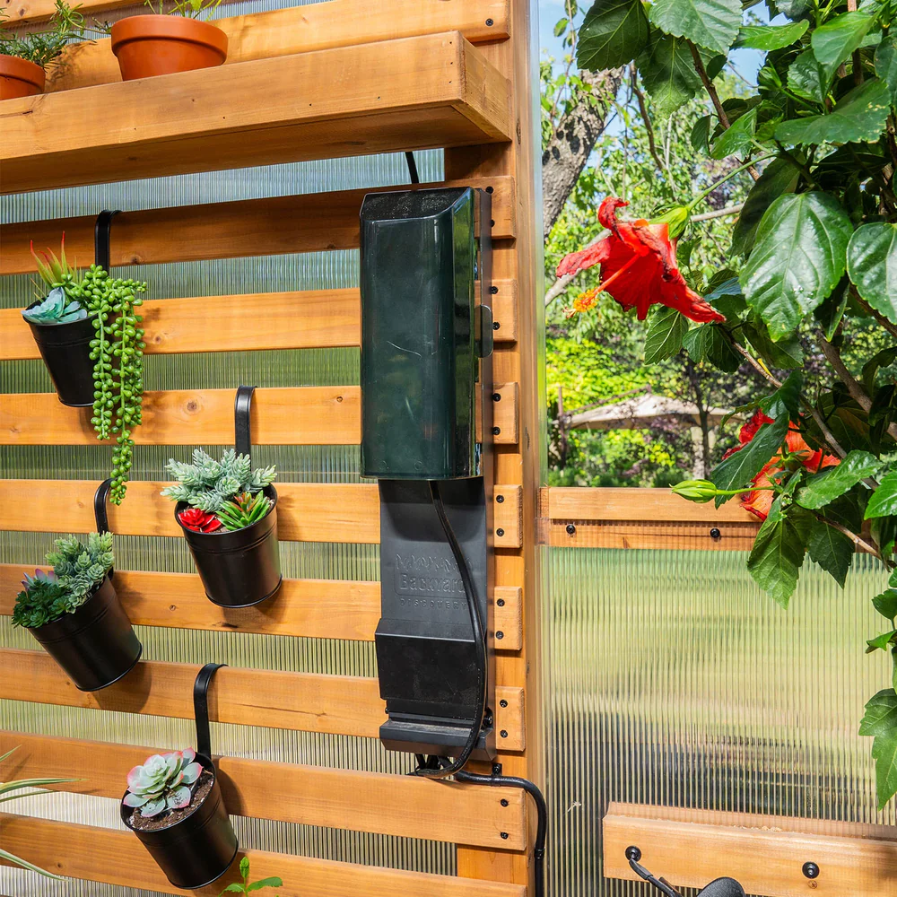 With cedar wood, a strong roof, and an array of useful features, this greenhouse combines the best materials with thoughtful design.